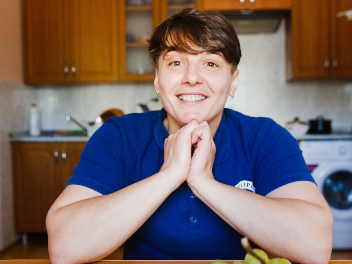 Warm, friendly portrait in a homely kitchen setting